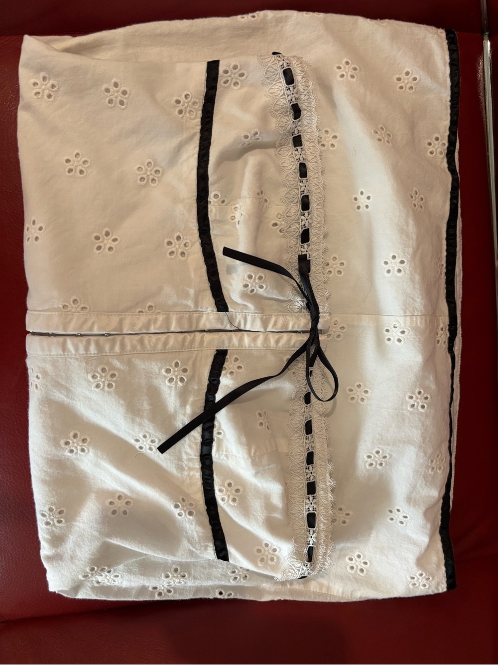 Strapless White Eyelet Mini Dress with Black Trim and Bow - Picture 3 of 3
